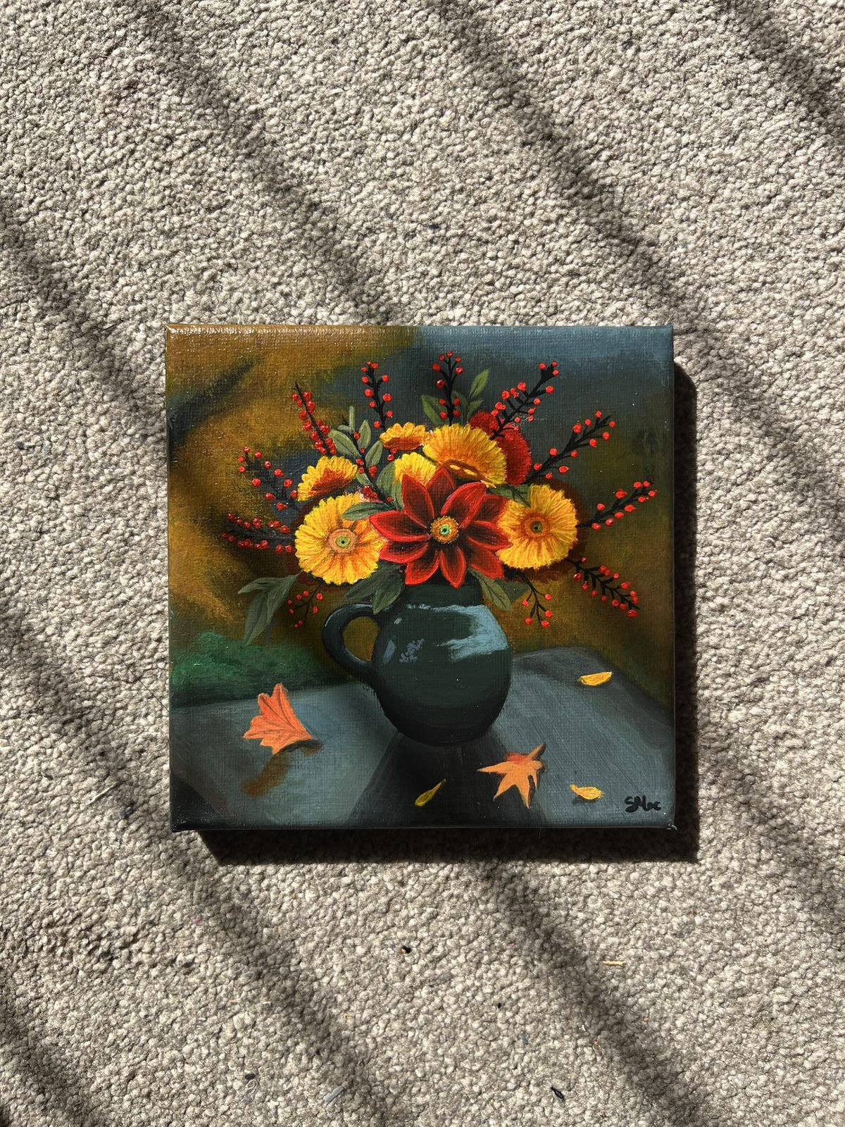 The Autumn Bloom canvas laid flat, showing the whole painting and the signature