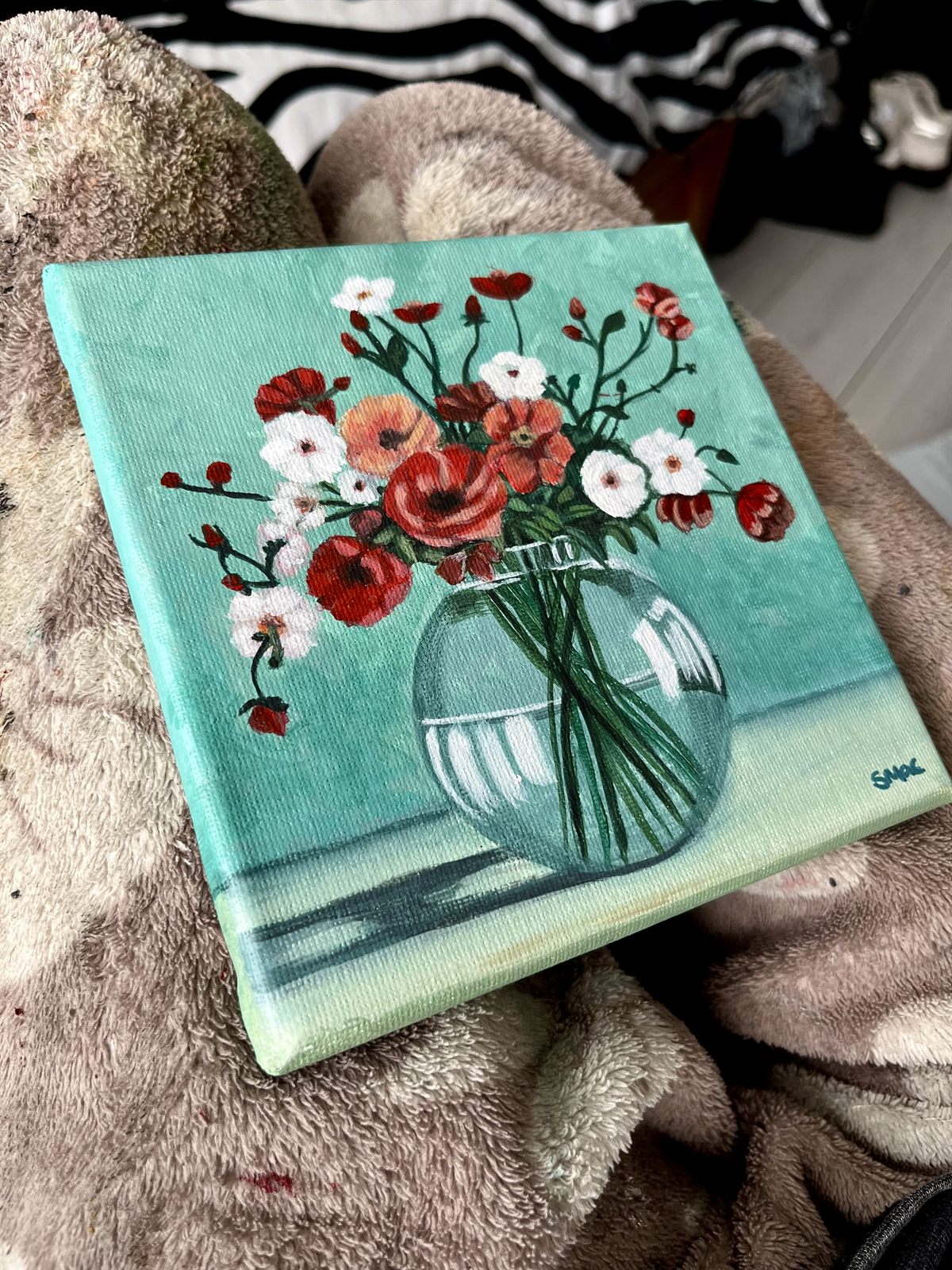 Gathered Blooms propped at an angle, showing the depth of the stretched canvas