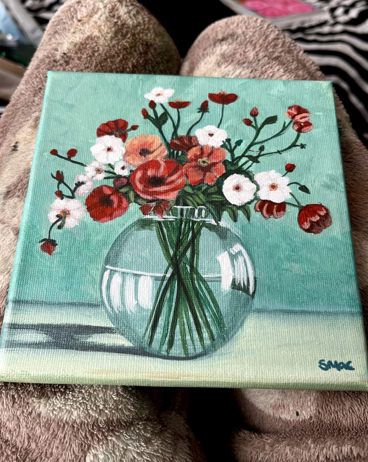 Gathered Blooms resting on a blanket, straight on
