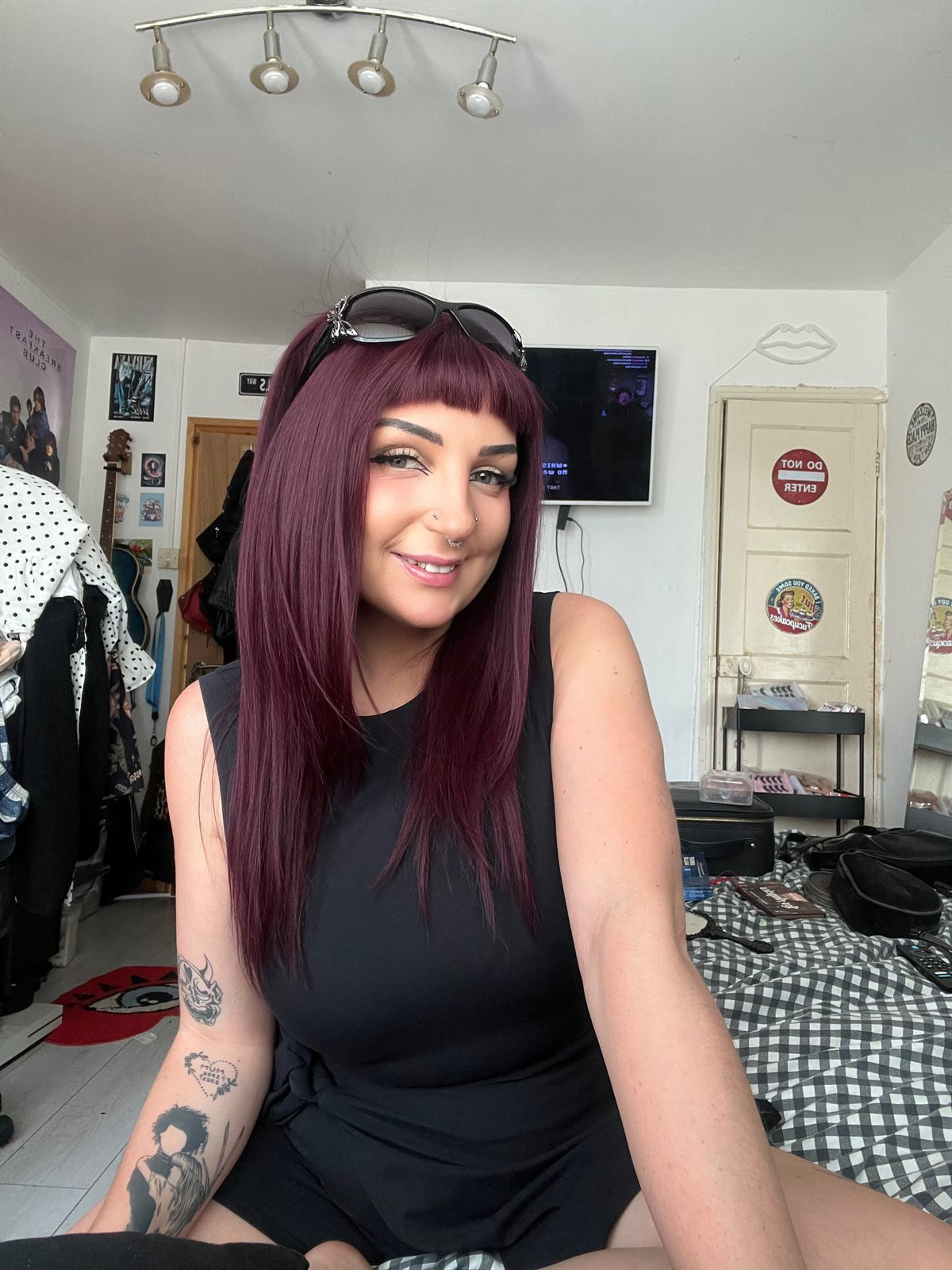 Sarah, smiling at the camera